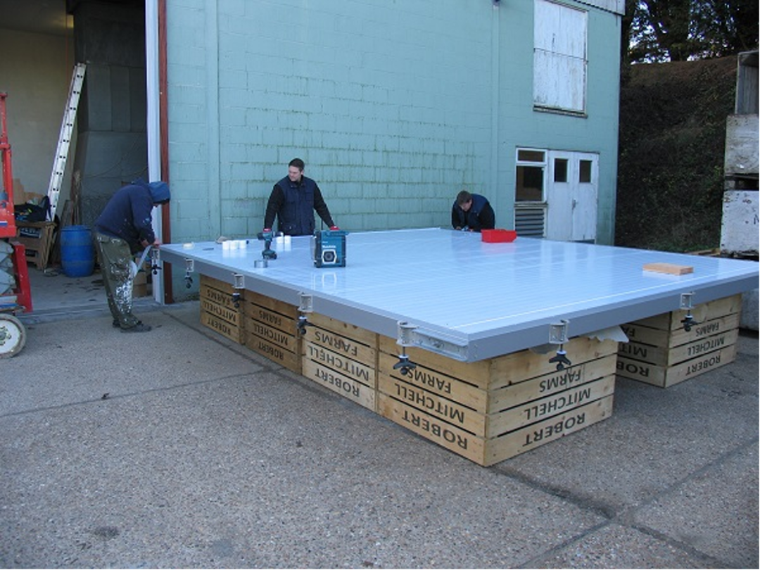 A new cold store door being fitted at Robert Mitchell Farms